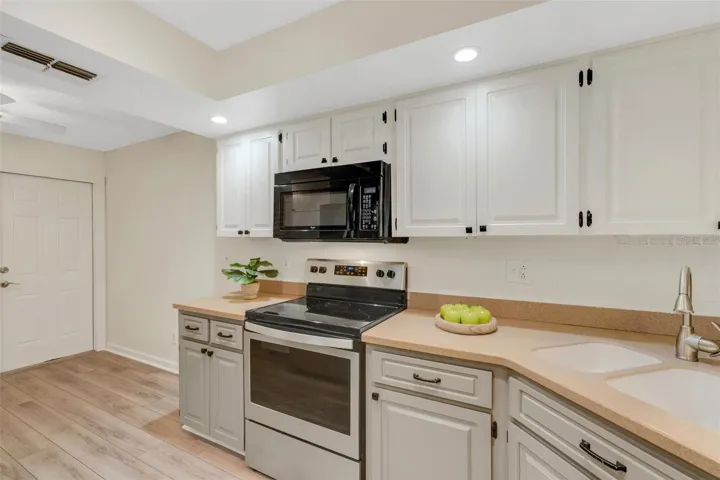 Panel door connects garage & kitchen~