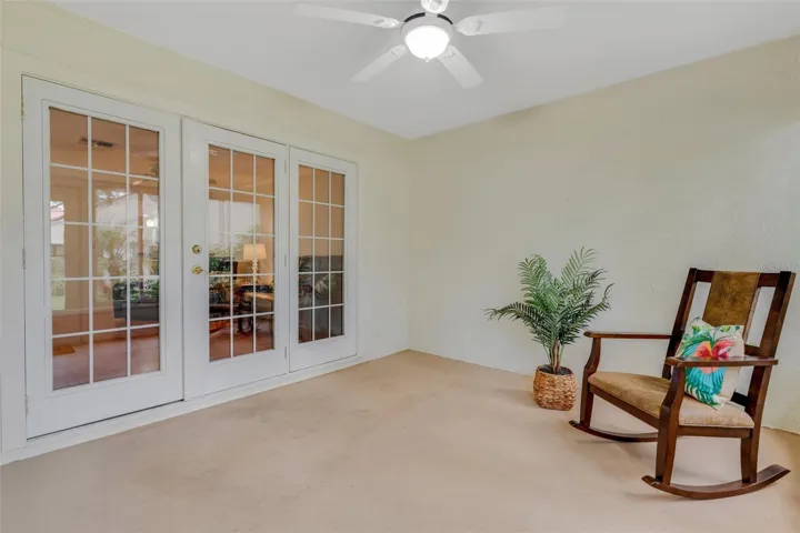 French doors to bonus sunroom from both main living & master suite~