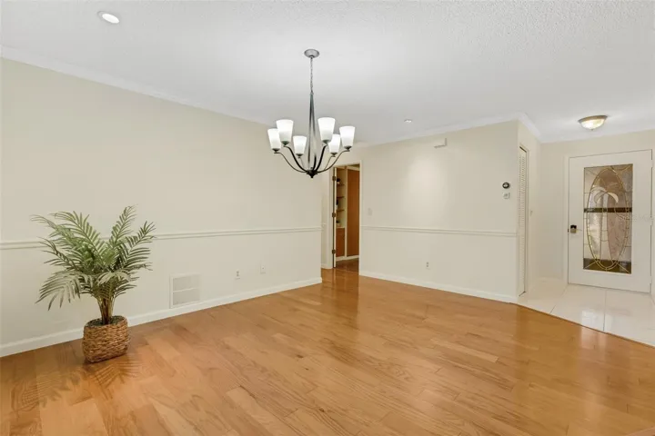 Dining area with guest bedroom & full bath to left~