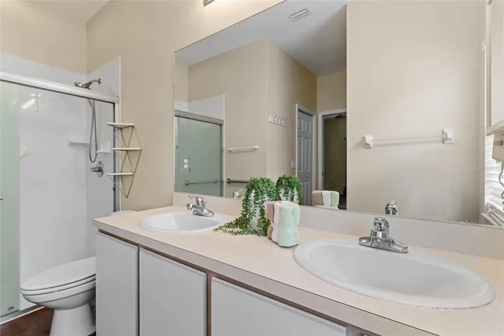 Primary Bathroom features dual sinks and a built in dryer