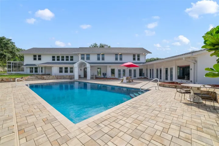 All the character of a 1936 ESTATE HOME on 2+ ACRES with GATED ACCESS, a COURTYARD POOL and PRIVATE BEACH on Silver Lake plus TONS OF MODERN UPDATES and all the flexible space you could ask for - WELCOME HOME!