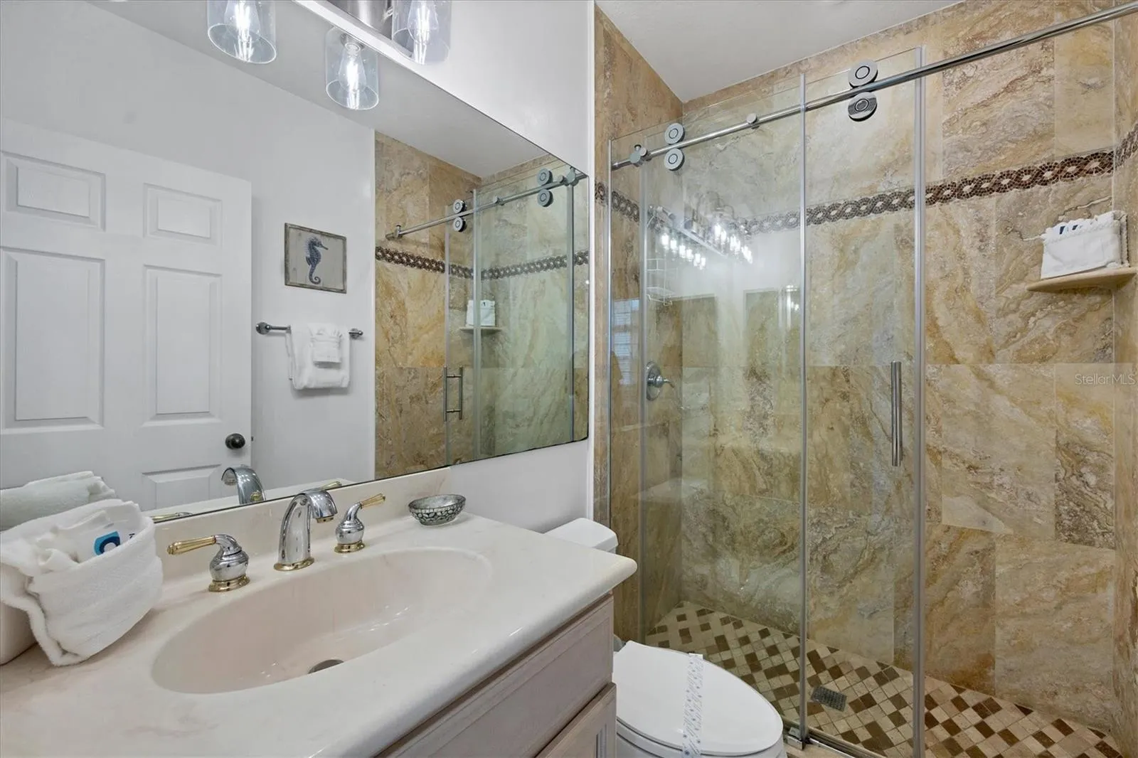 En suite with glass enclosed shower!