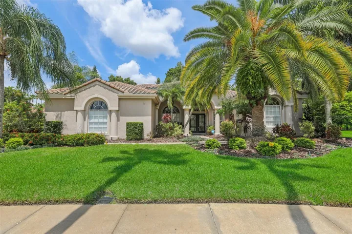Large yard with new landscaping, irrigation on remote control and lighting.