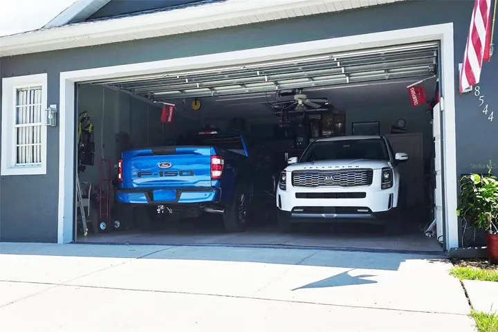 Oversized garage, big enough for 2 trucks + storage.