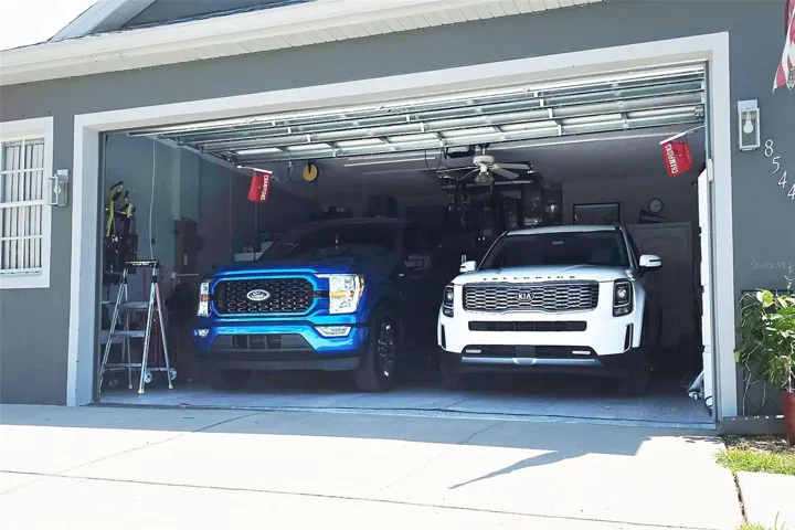 Oversized garage, big enough for 2 trucks + storage.