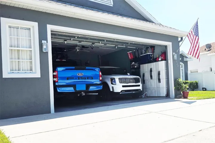 Oversized garage, big enough for 2 trucks + storage.