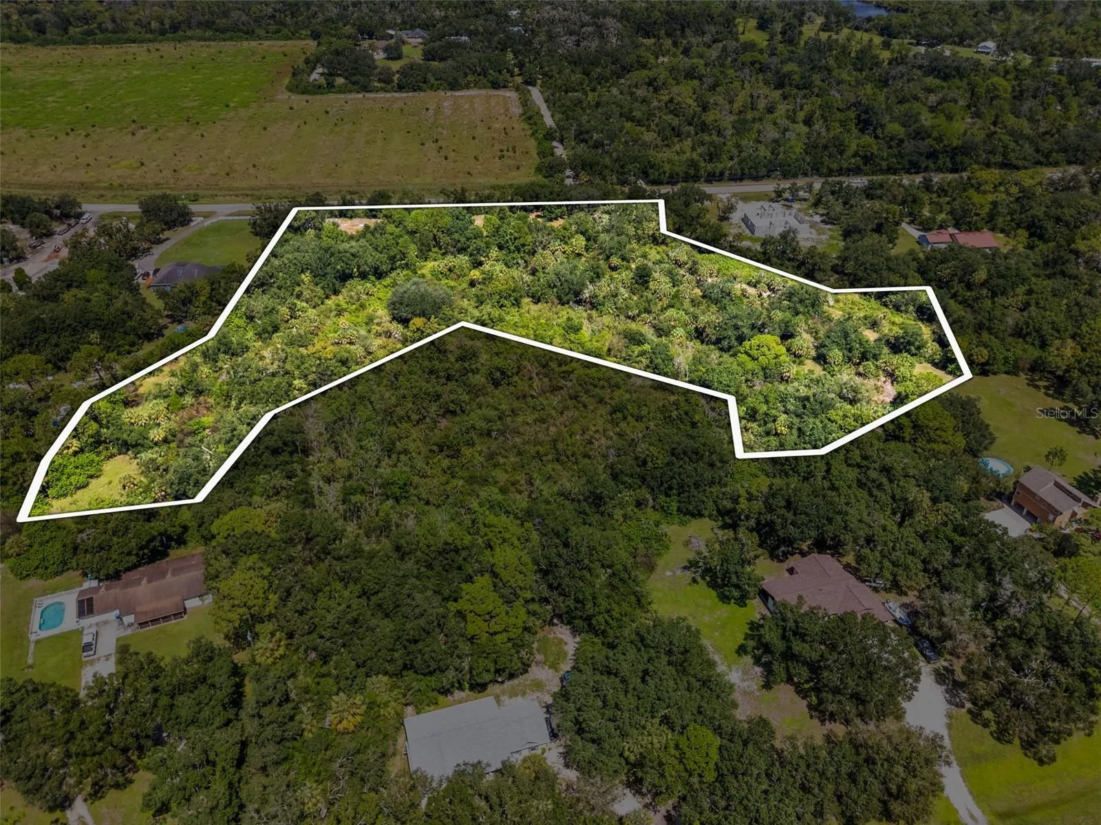 Fully fenced and back of the property backs up to wetlands