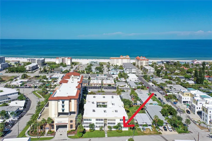 Areal. Red arrow points to the condos location