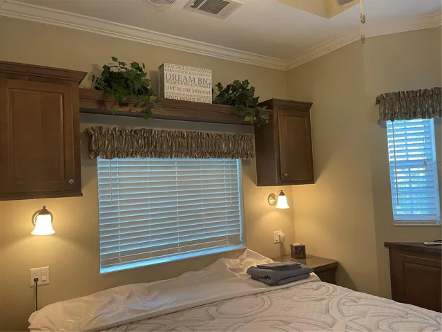 Sconce lighting on wall. Tray Ceiling