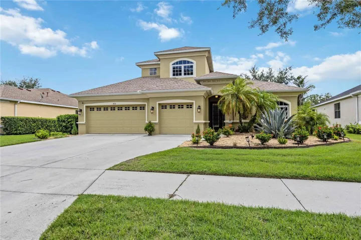 432 Snapdragon Loop Bradenton, FL 34212 Meticulously maintained landscaping in front of home creating great curb appeal in Greyhawk Landing community where fencing is allowed .  432 Snapdragon Loop, Bradenton, FL 34212