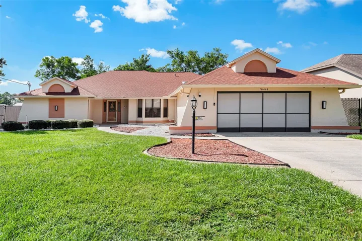Front of this Lovely Home with Beautiful Curb Appeal.
