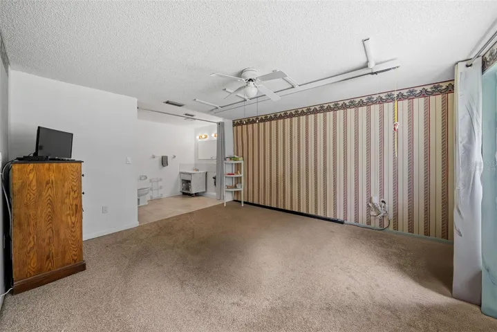 Master bedroom virtually staged without current bed in it.