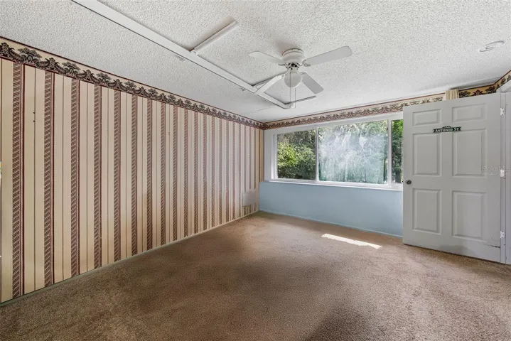 Master bedroom virtually staged without a bed