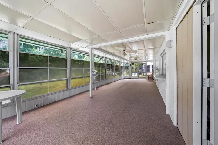 Lanai virtual staging with physical therapy parallel bars removed