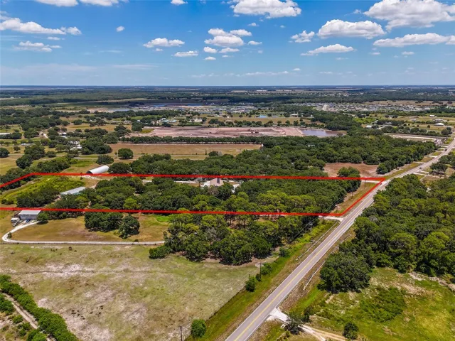 drone pic of 9 acre parcel with main home  15440 CR 675 and in law suite