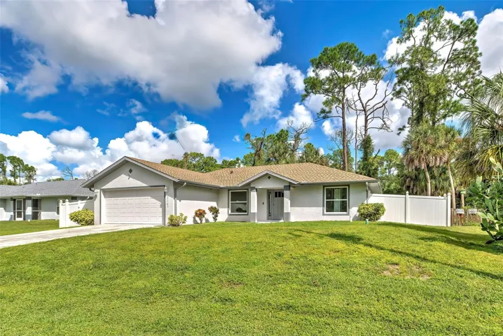 CENTRALLY LOCATED IN PORT CHARLOTTE. 3 BEDROOMS- 2 BATHROOM - 2 CAR GARAGE
