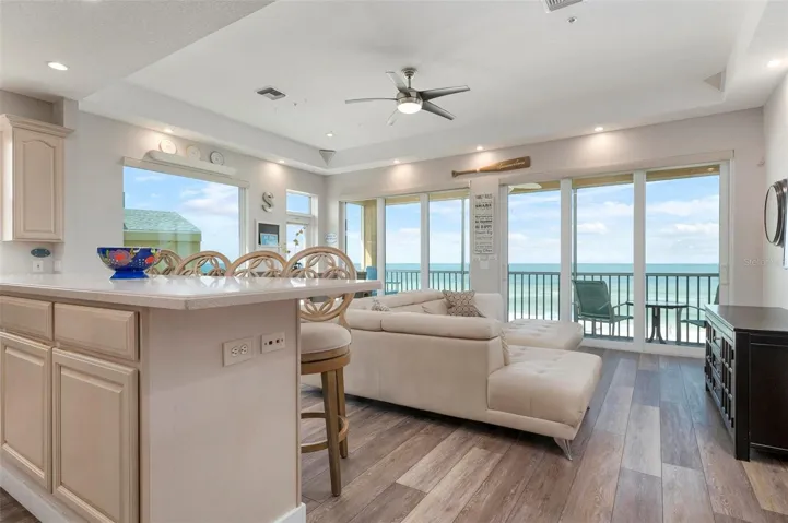 Open concept living with direct beachfront views
