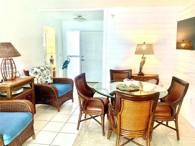 casual seating and eating area with TV