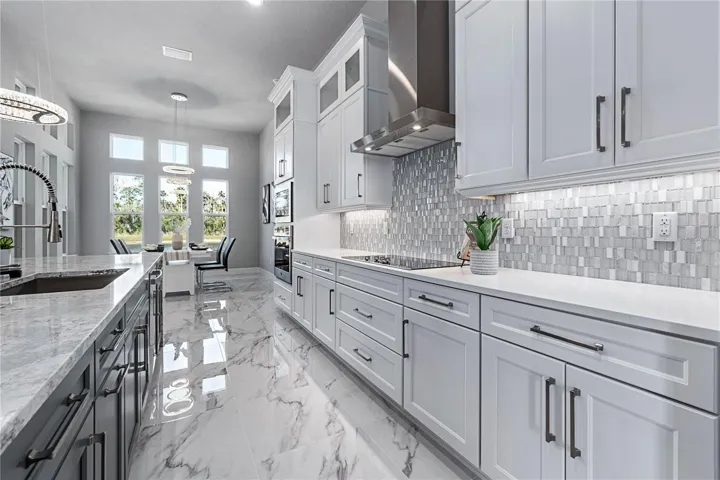 Kitchen opens up to Breakfast Nook