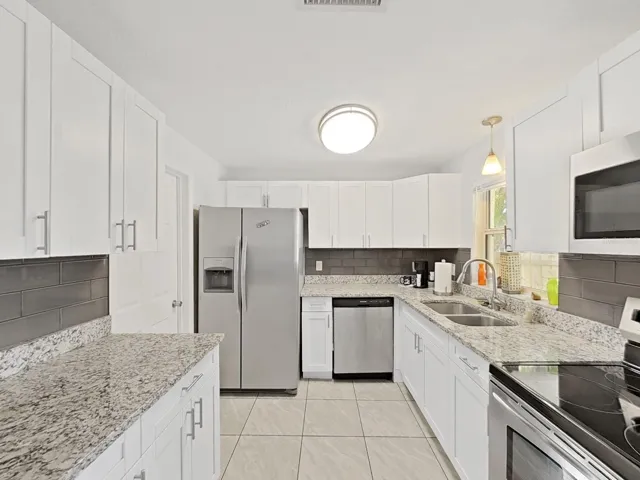 Kitchen with all stainless appliances