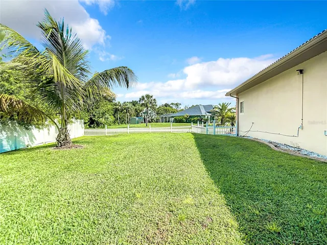 BACKYARD LEFT SIDE OF THE HOME