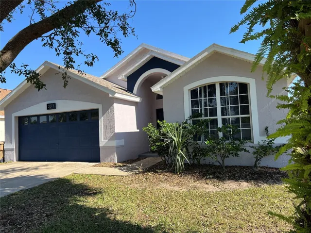 Front view with 2 car garage.