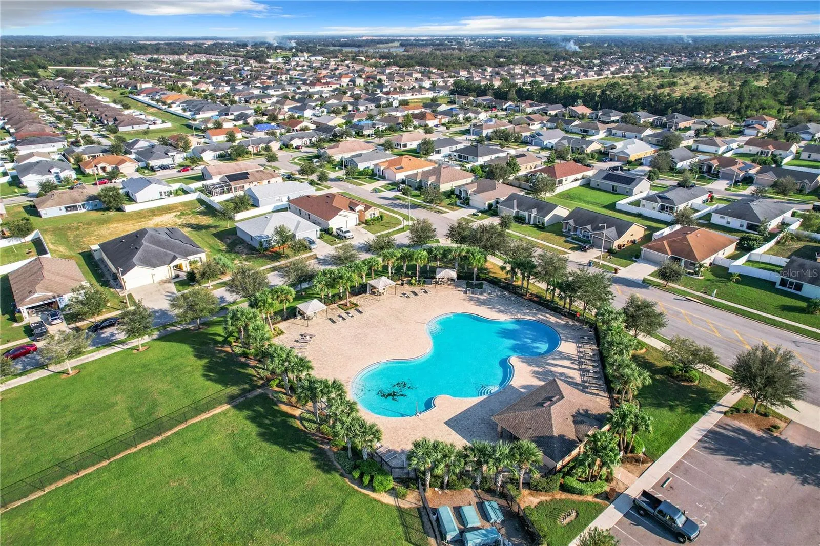 COMMUNITY POOL AND PLAYGROUND DRONE VIEW