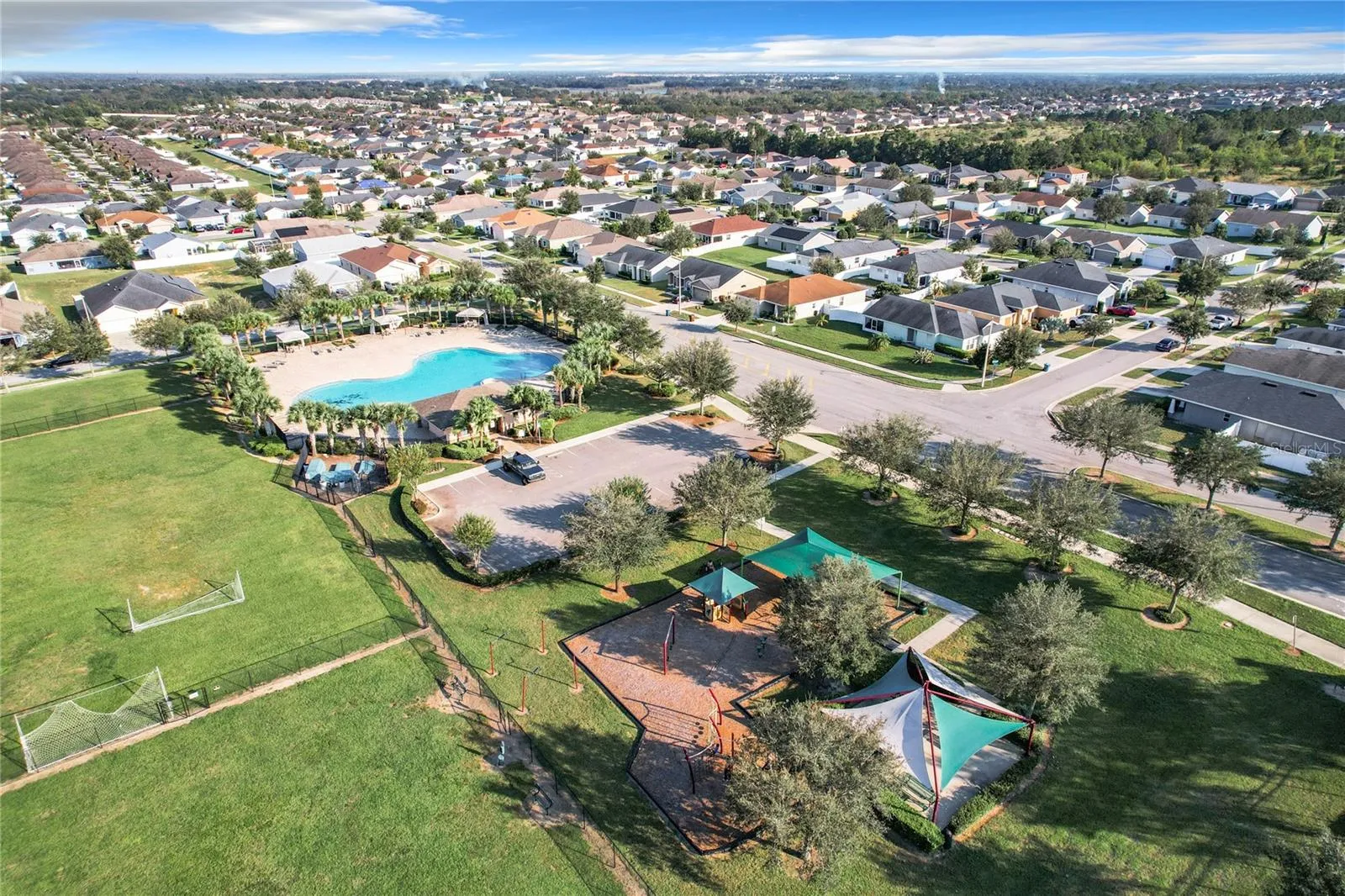 COMMUNITY POOL, SOCCER FIELD AND PLAYGROUND