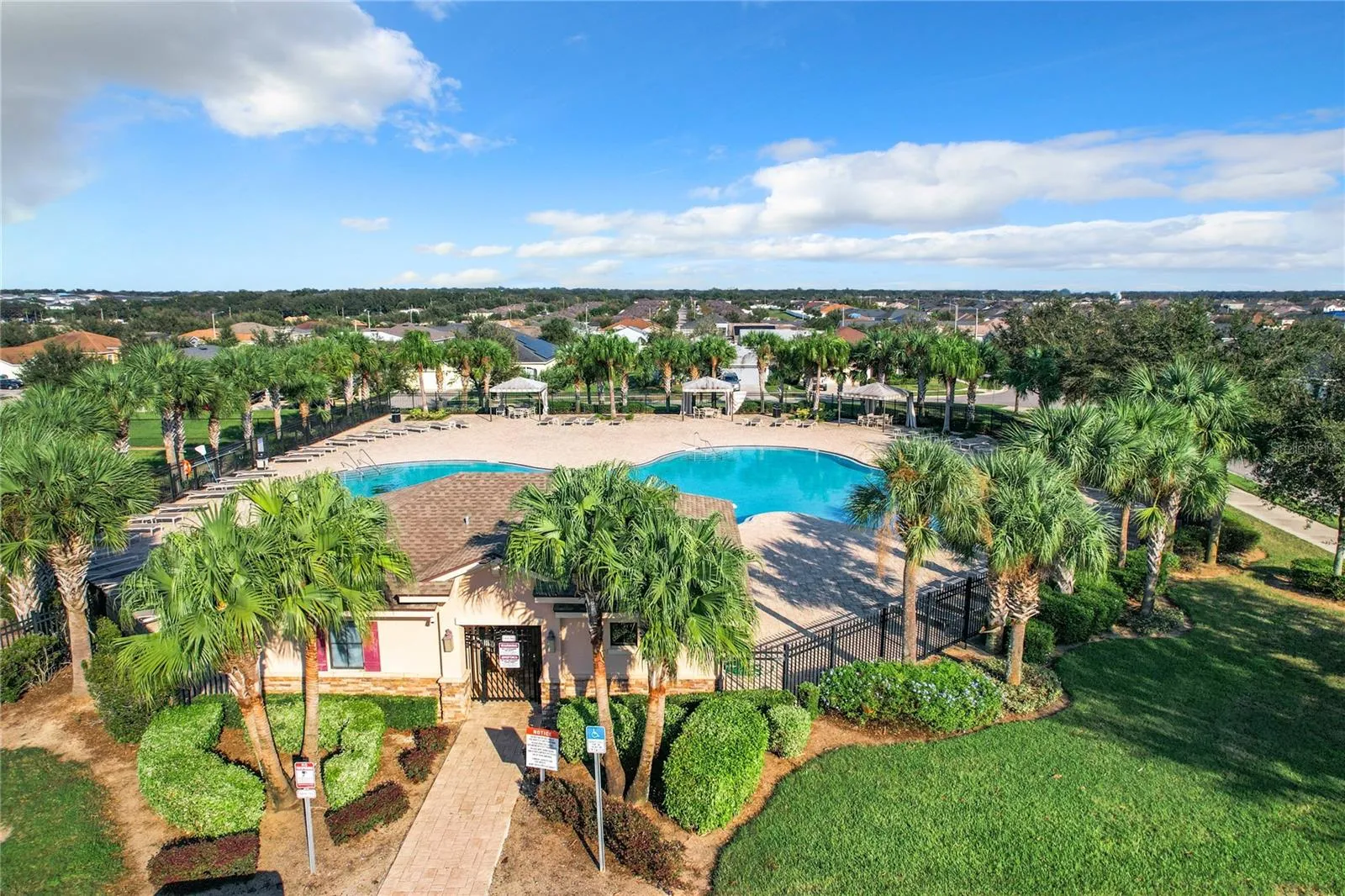 COMMUNITY POOL AND PLAYGROUND DRONE VIEW 4