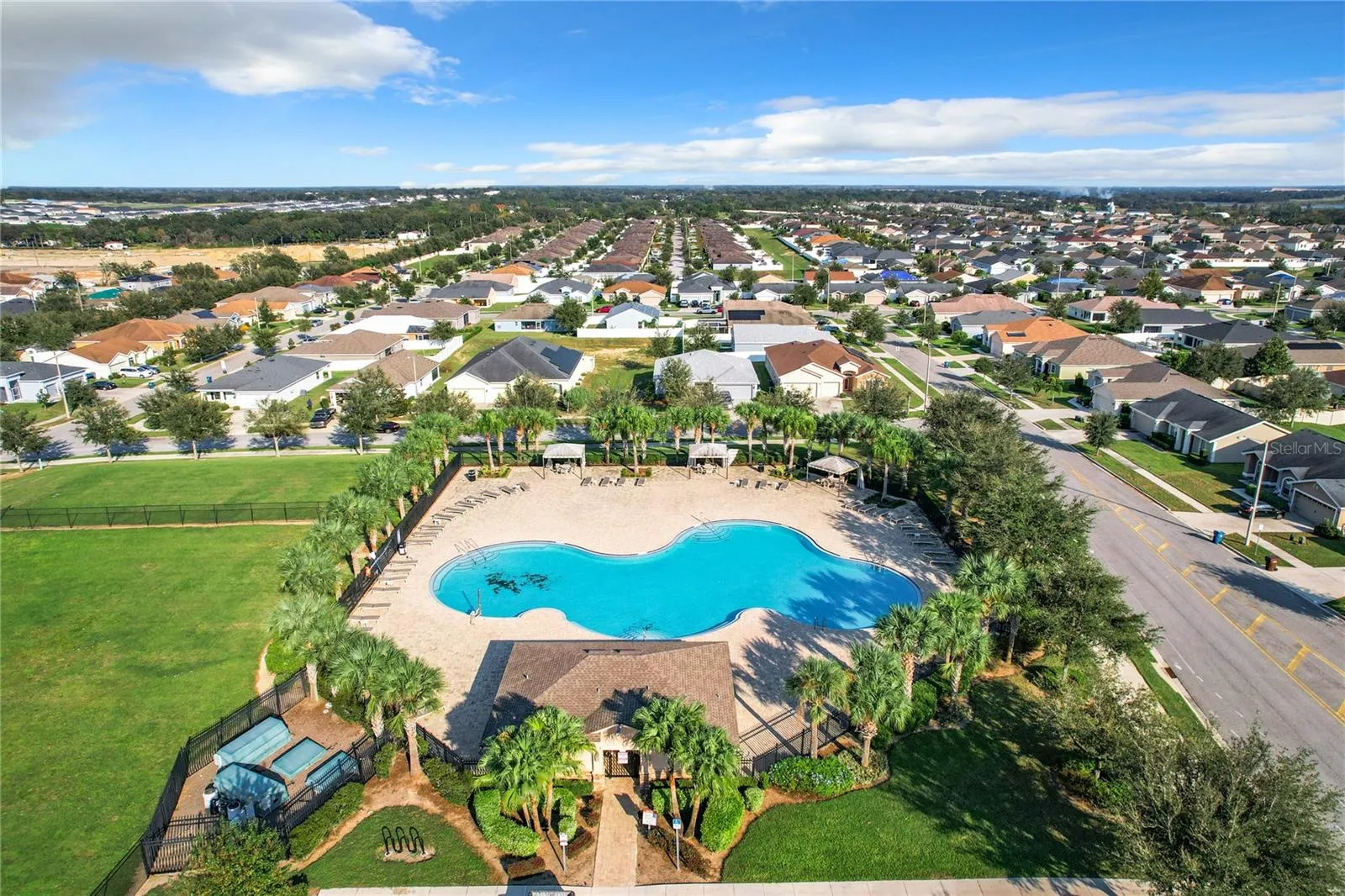 COMMUNITY POOL AND PLAYGROUND DRONE VIEW 2