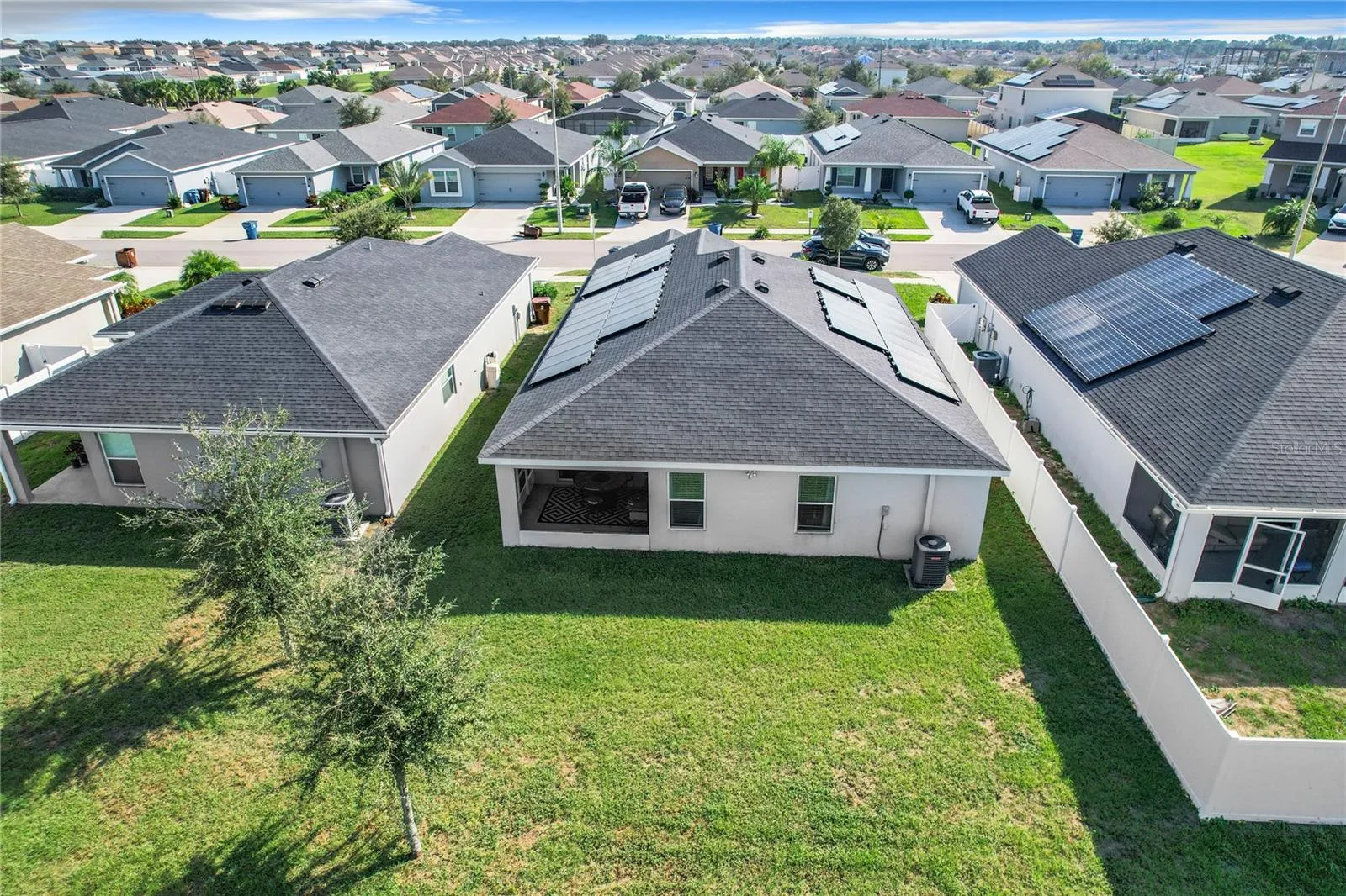 BACK PATIO AND HOUSE VIEW - DRONE