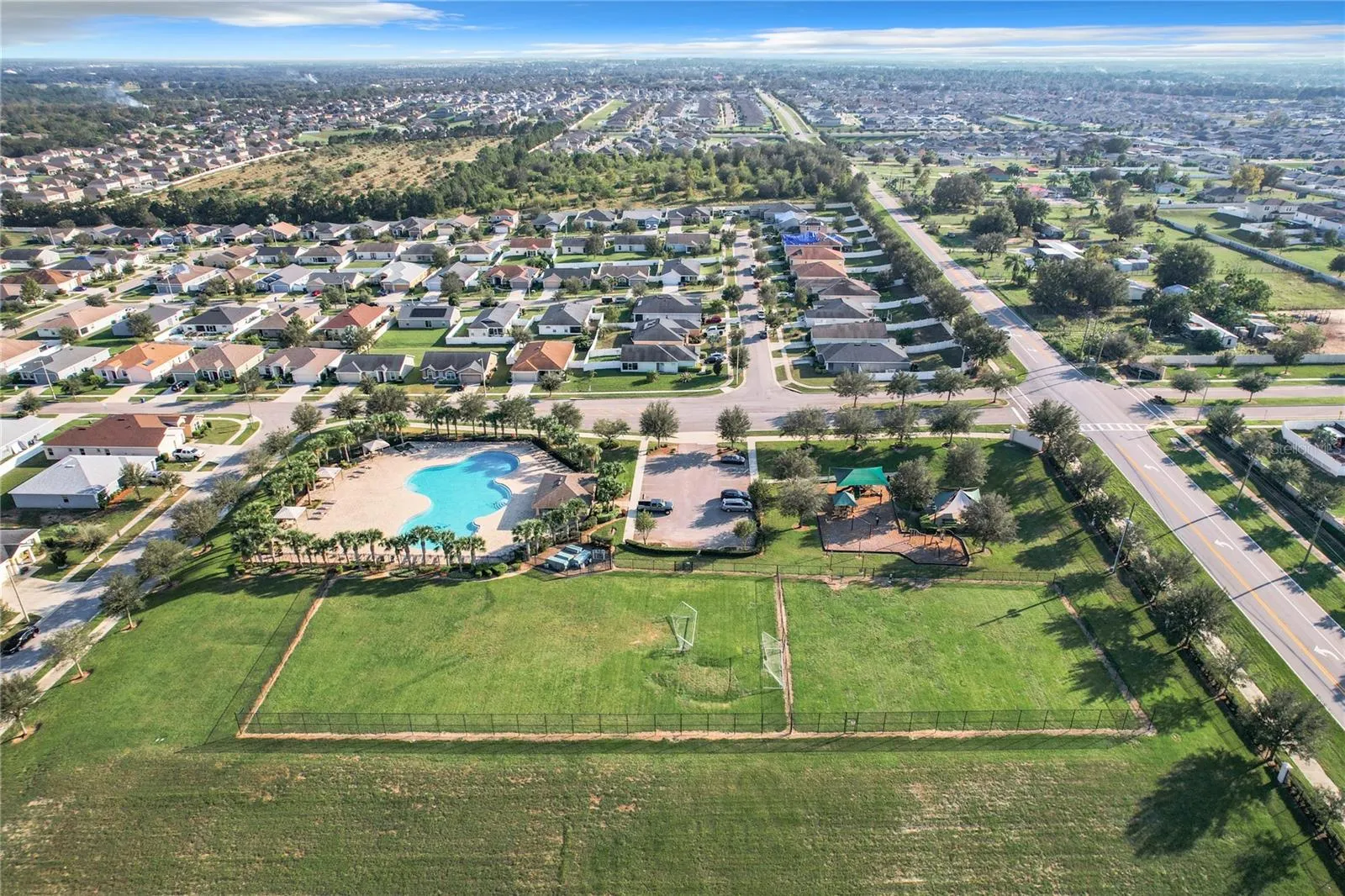COMMUNITY POOL, SOCCER FIELD AND PLAYGROUND