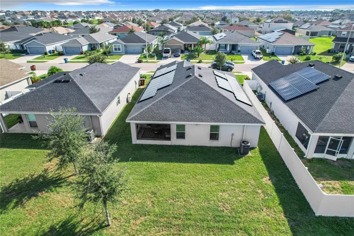 BACK PATIO AND HOUSE VIEW - DRONE