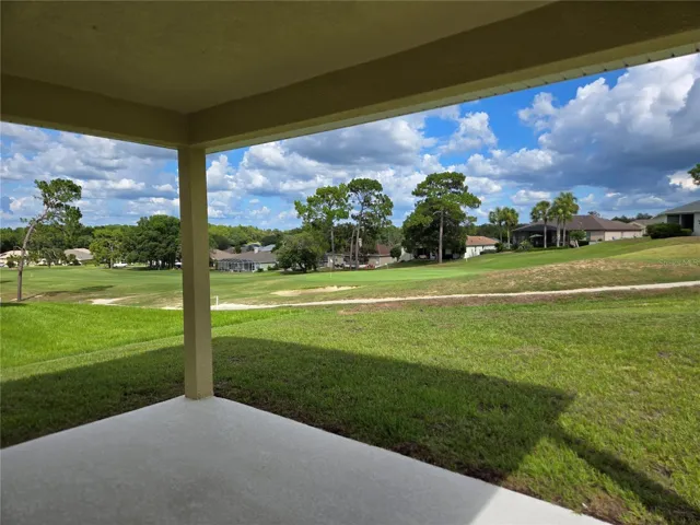 covered lanai with golf course view