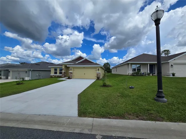 front of home with light post