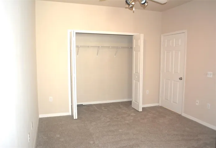 2nd Bedroom closet and access door to 2nd Bathroom