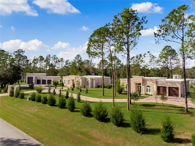Main residence in center, 2nd residence and garage with RV garage