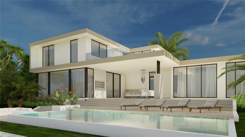 Rear elevation shows oversized lanai and outdoor kitchen. Enjoy bay views from your heated pool, complete with a spa and sunshelf.
