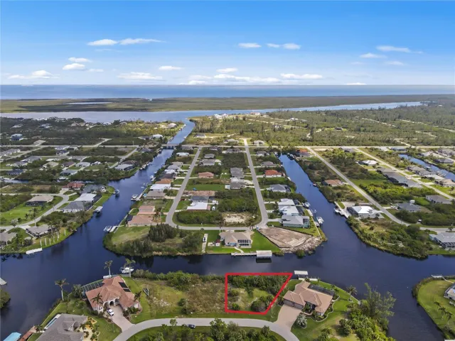 Build your Florida Dream Home on this Rarely Available Oversized, Gulf Access Lot with 133' of Waterfront!