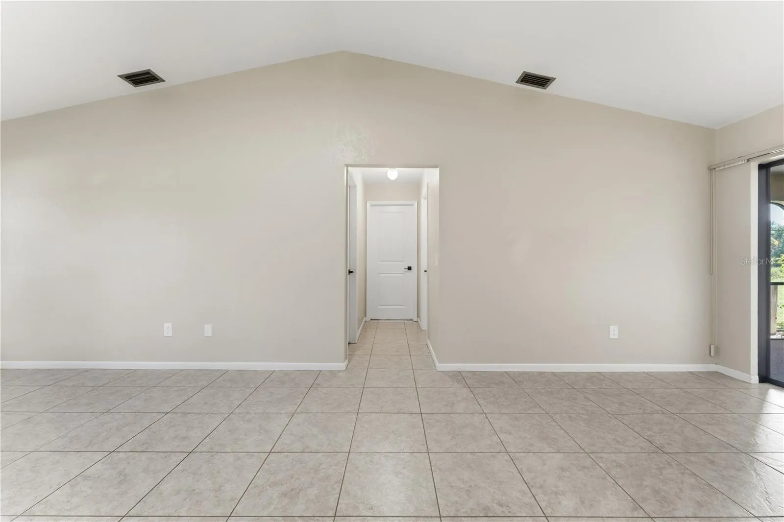 VEIW FROM KITCHEN TO BACK BEDROOMS AND GUEST BATH
