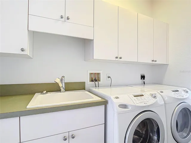 Laundry between Kitchen Hall and Garage