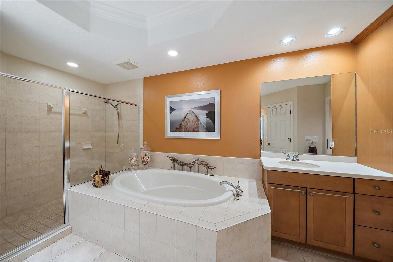 Primary ensuite bathroom - soaking garden tub & private toilet closet