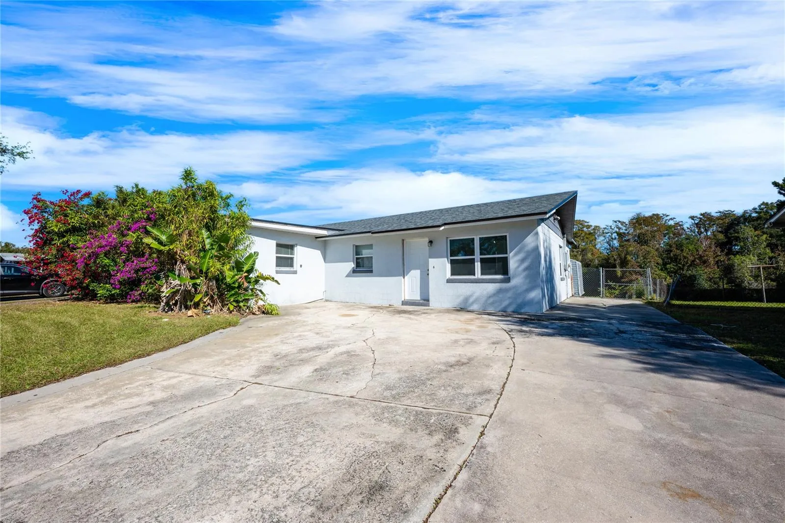 NEWER ROOF (2022), WATER VIEWS, NO HOA, and close to Metro West, Downtown Orlando, major roadways, shopping, dining and so much more!