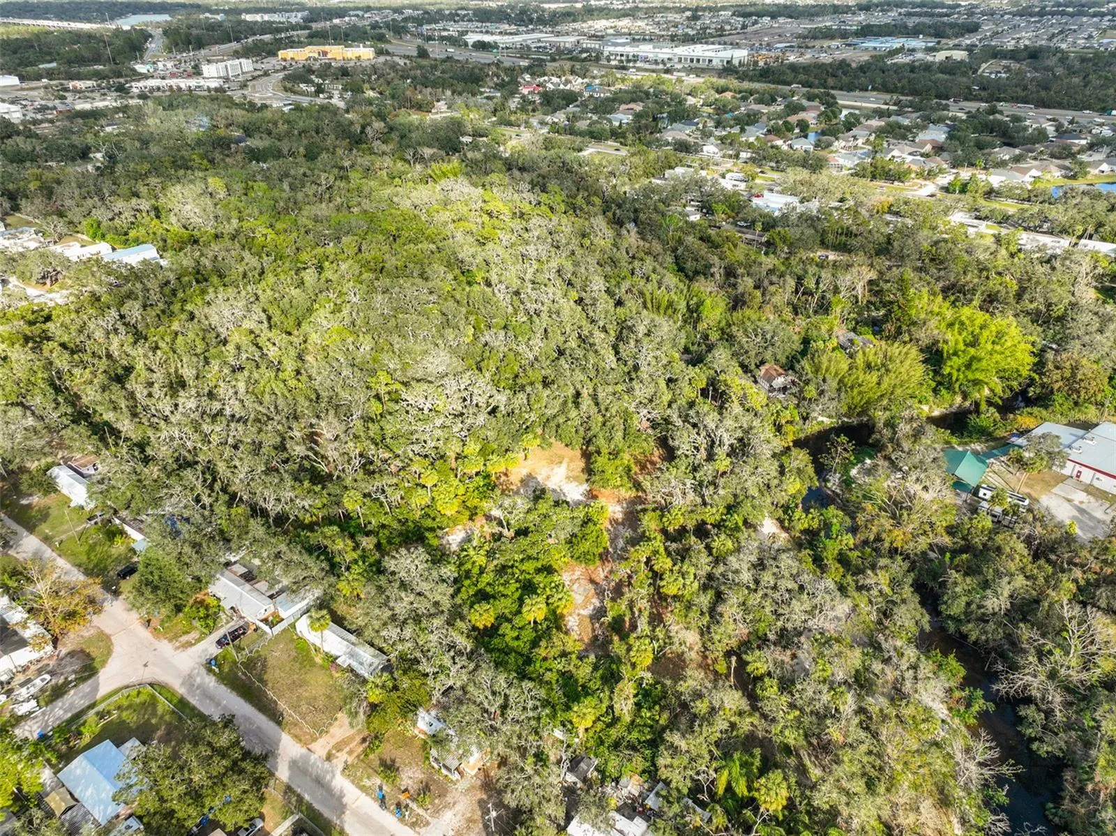 Peaceful acreage ready to build your family compound or develop a few homes