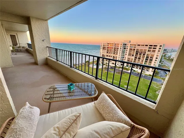 Spacious private GULF to BAY view balcony is over 300sf- spanning living area and bedrooms.