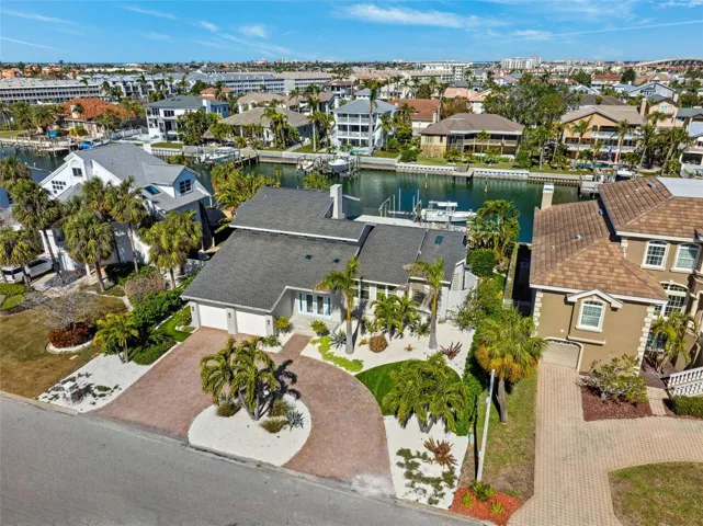 Completely updated 3500SF+ waterfront home in Tierra Verde on 90 ft of deep protected waterfront with two boat lifts.