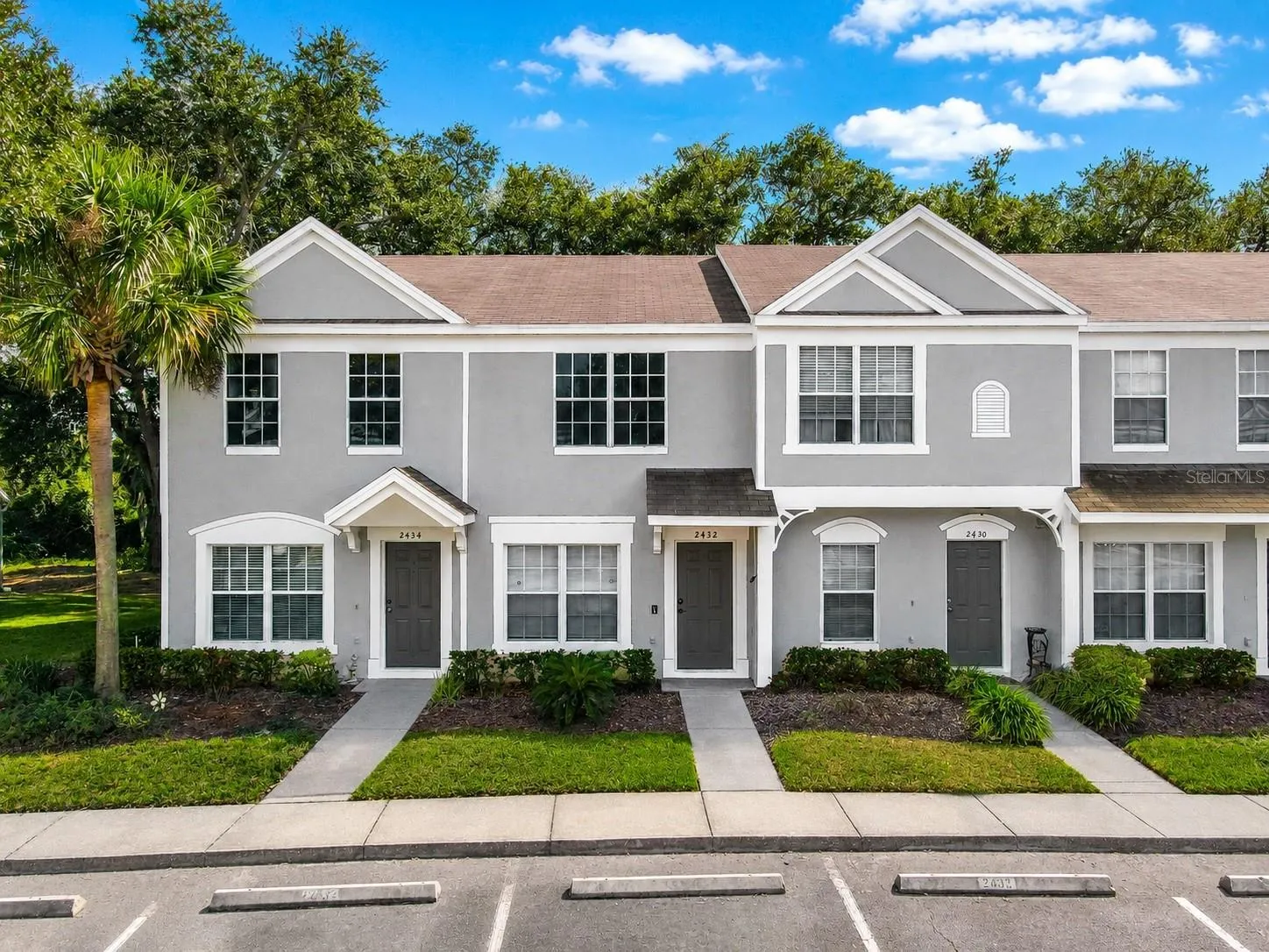 2 bedroom, 1 full bath, 1 half bath townhome with screened in porch.