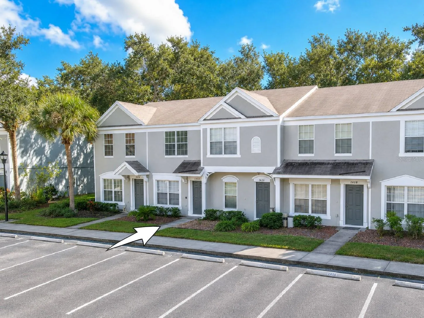 2 bedroom, 1 full bath, 1 half bath townhome with screened in porch.