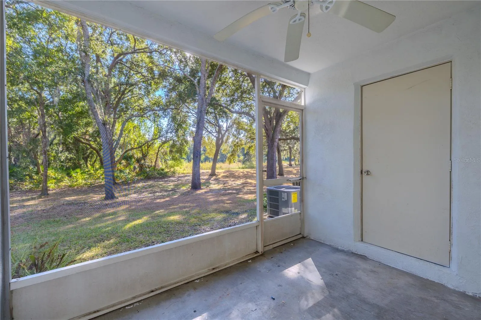 The private screened in porch has additional storage.