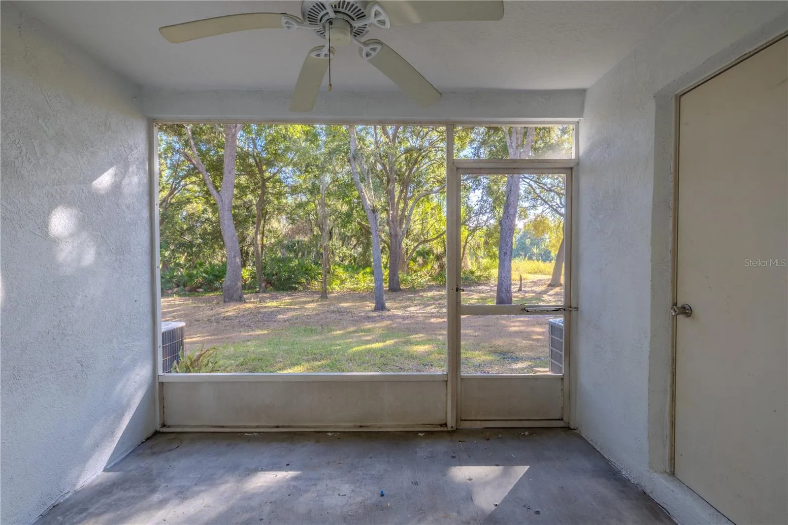 The private screened in porch has additional storage.